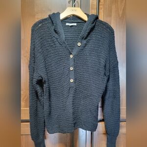 Black hooded sweater